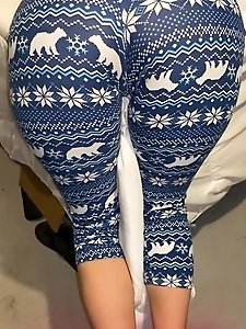 A young mom in a simple housedress